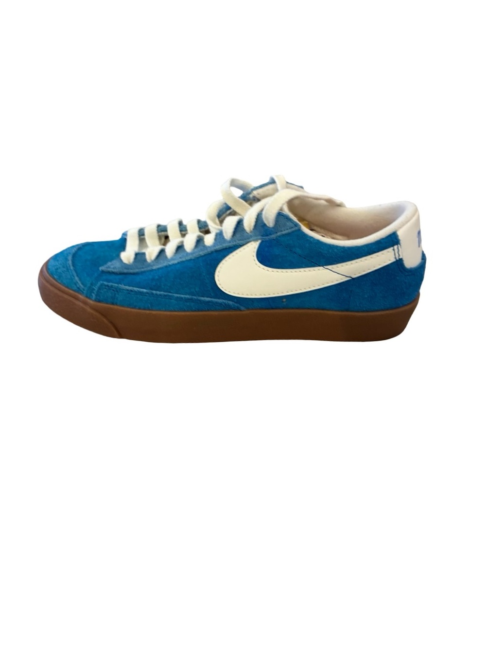 Nike Blue Suede Low-Top Sneakers with White Swoosh and Gum Sole